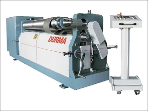 A pale blue industrial machine sits against a white background. Several rollers and metal components are visible across its upper section. A freestanding control panel on wheels stands to the right. The word DURMA appears in red on the machine.