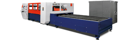 A long industrial machine with a dark blue flat work bed is isolated against a white background. Its gray and white housings include a red panel at the left end. A rectangular gray cabinet stands behind the machine's right side.