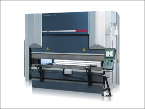 A large gray industrial metalworking machine is shown against a white background. Its upper beam sits above a long lower work surface, with several supports spanning the opening. A control screen and buttons are mounted on a narrow console at the right.